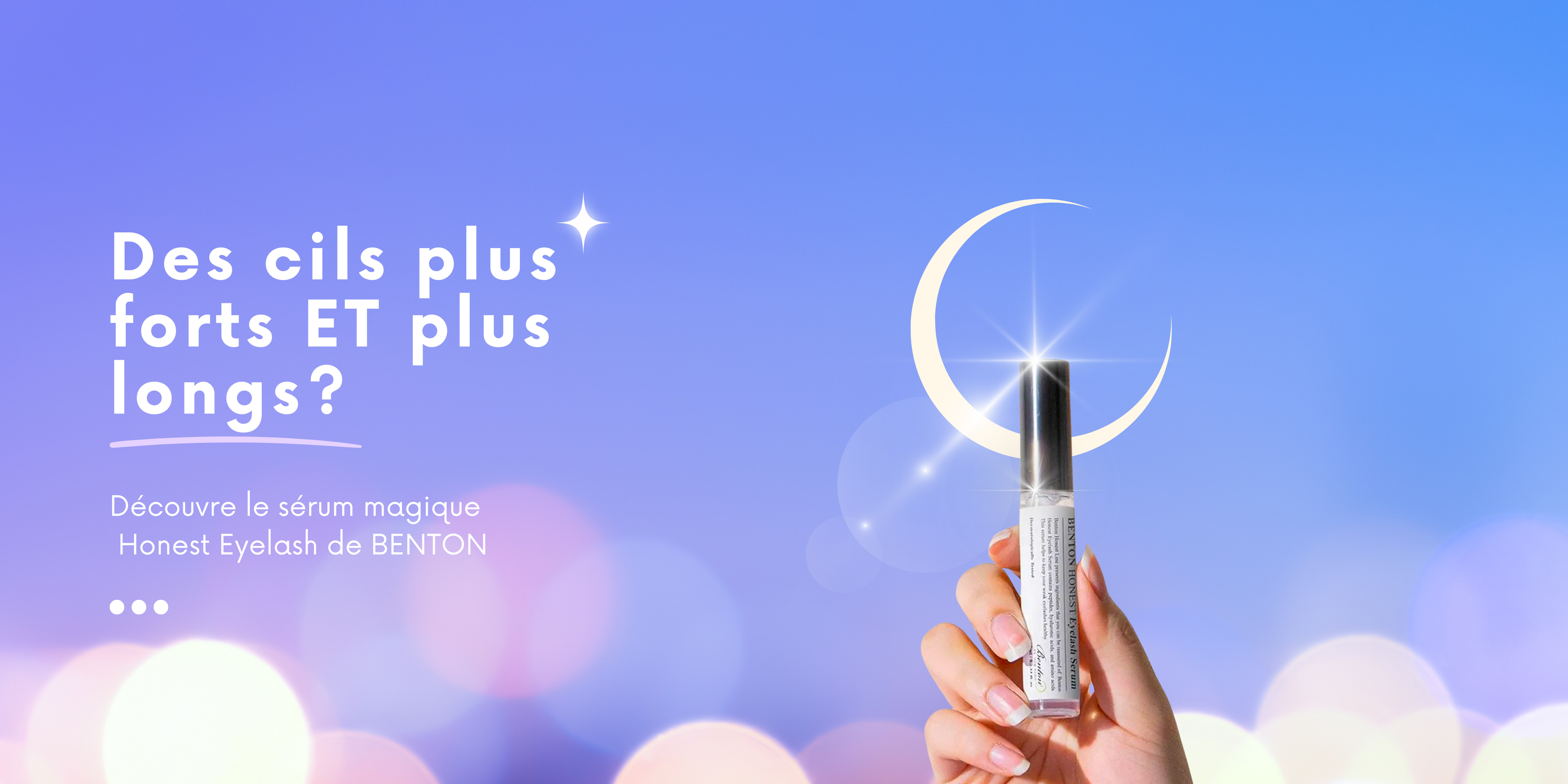 Sérum  fortifiant pour cils Honest Eyelash de Benton tenu du bout des doigts, style Sailor Moon.